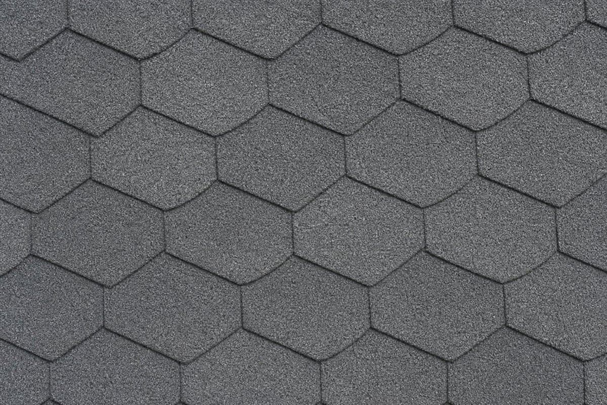 Freshly cleaned algae-free roof shingles